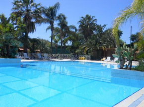 Apartment with pool and tennis court near beach and coastal caves